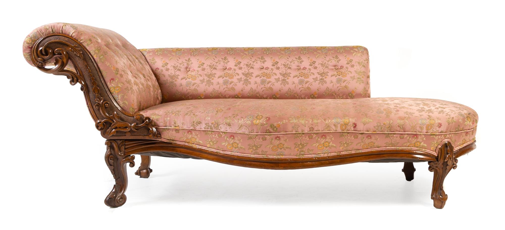 A Victorian Carved Walnut Chaise Width 72 inches. — 19TH CENTURY