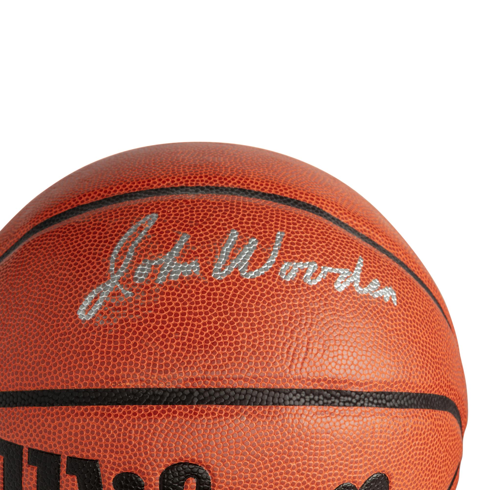 A Collection of Kareem Abdul-Jabbar and John Wooden Signed Autograph Basketballs