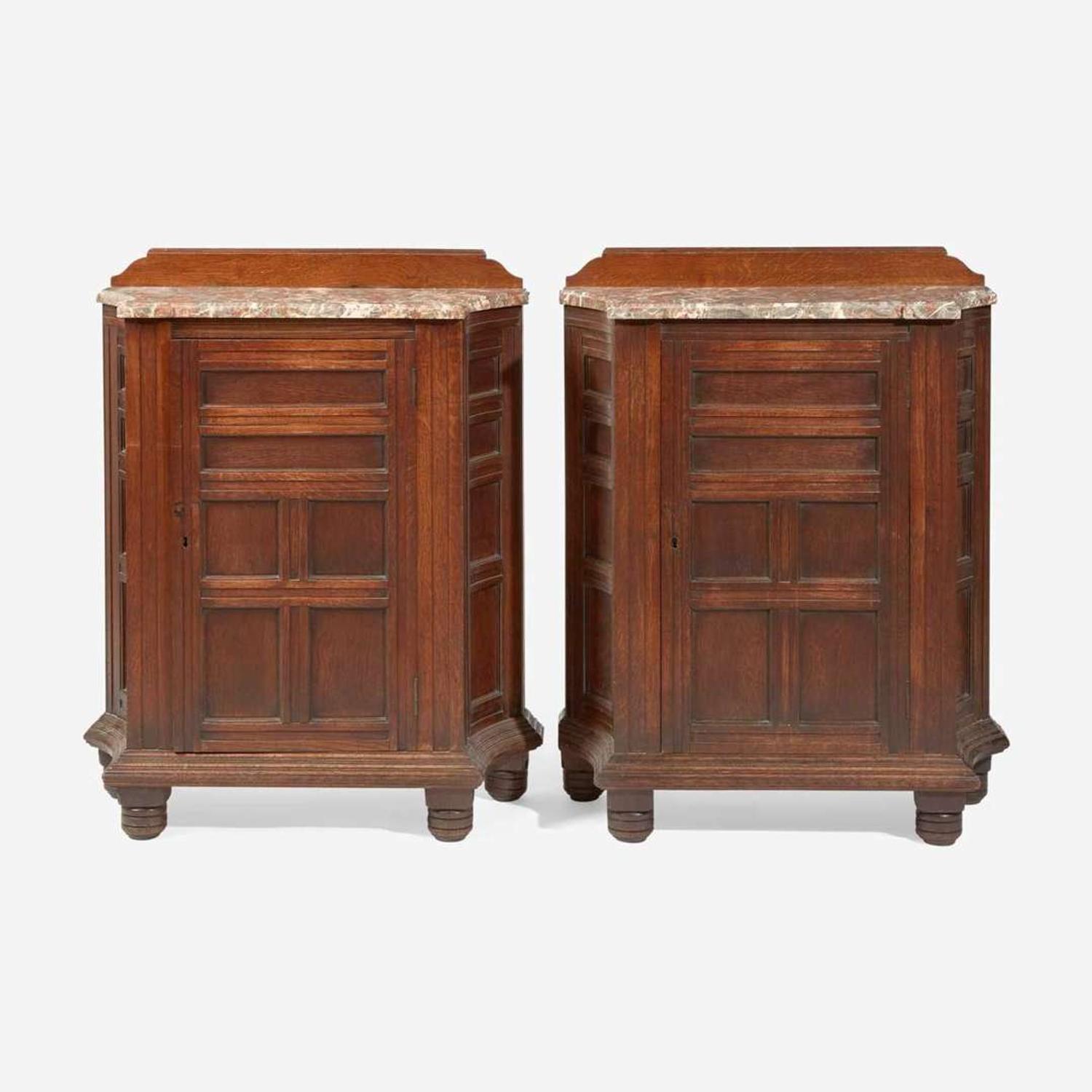 A pair of English Aesthetic Movement oak cabinets with Languedoc marble tops Attributed to Philip Webb (English, 1831-1915), England, circa 1870
