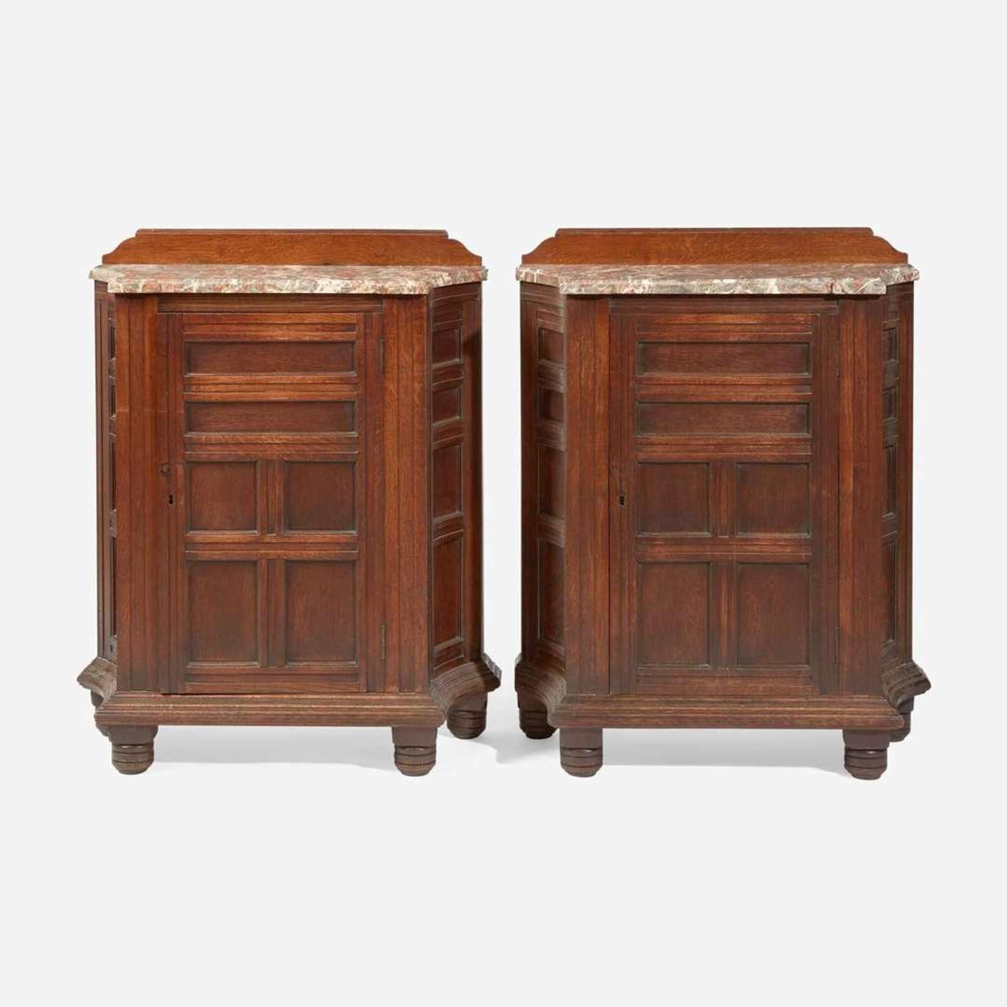 A pair of English Aesthetic Movement oak cabinets with Languedoc marble tops Attributed to Philip Webb (English, 1831-1915), England, circa 1870