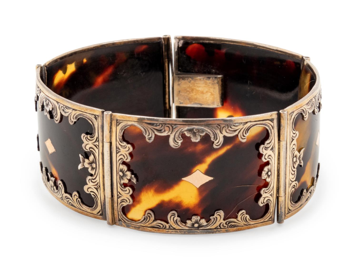 A Group of Silver-Mounted Tortoise Shell Table Articles