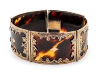 A Group of Silver-Mounted Tortoise Shell Table Articles