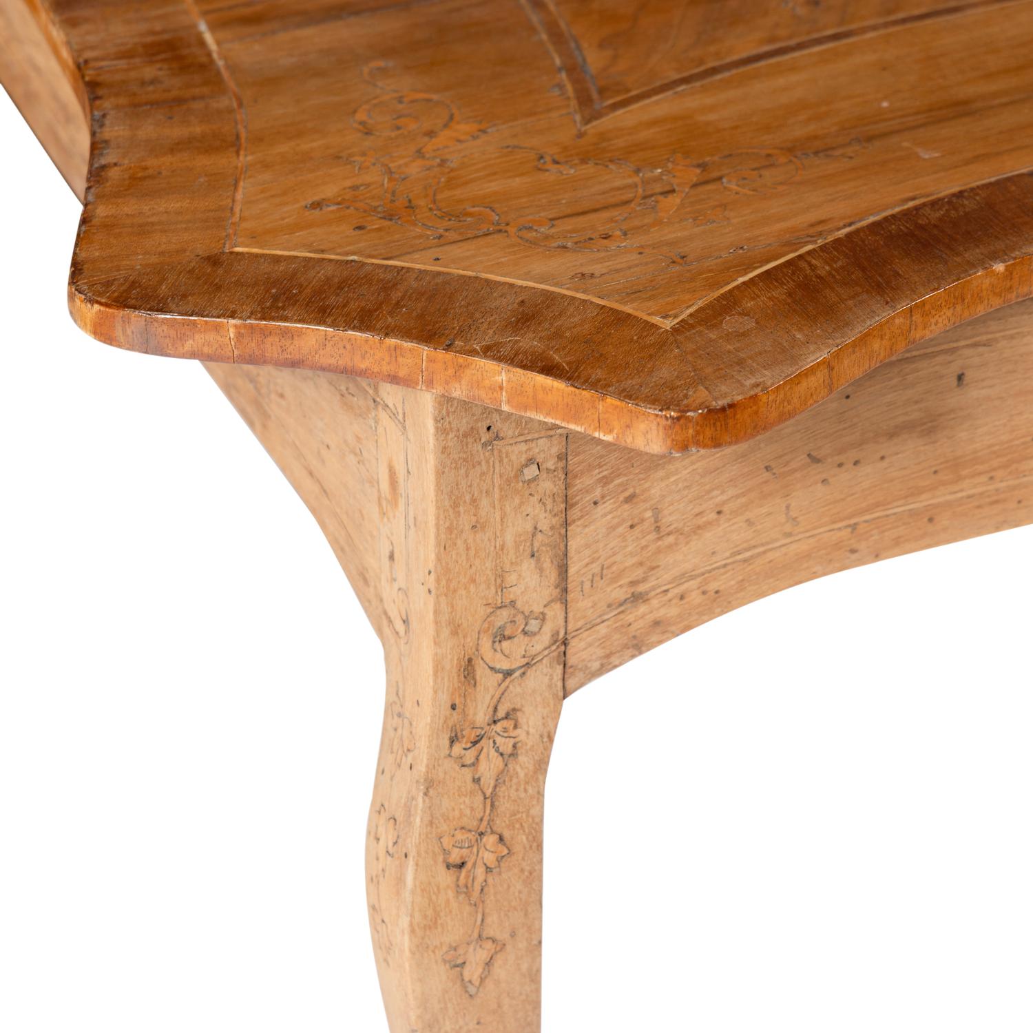 An Italian Walnut and Fruitwood Center Table