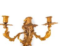 A Pair of Louis XV Style Gilt Bronze Three-Light Sconces