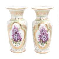 A Pair of Continental Porcelain Baluster Vases Height 10 inches x diameter 5 inches.