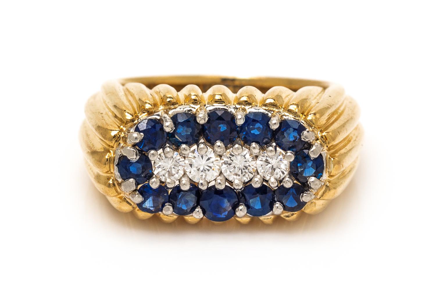 An 18 Karat Yellow Gold, Platinum, Sapphire and Diamond Band, Oscar Heyman Brothers, 10.70 dwts.