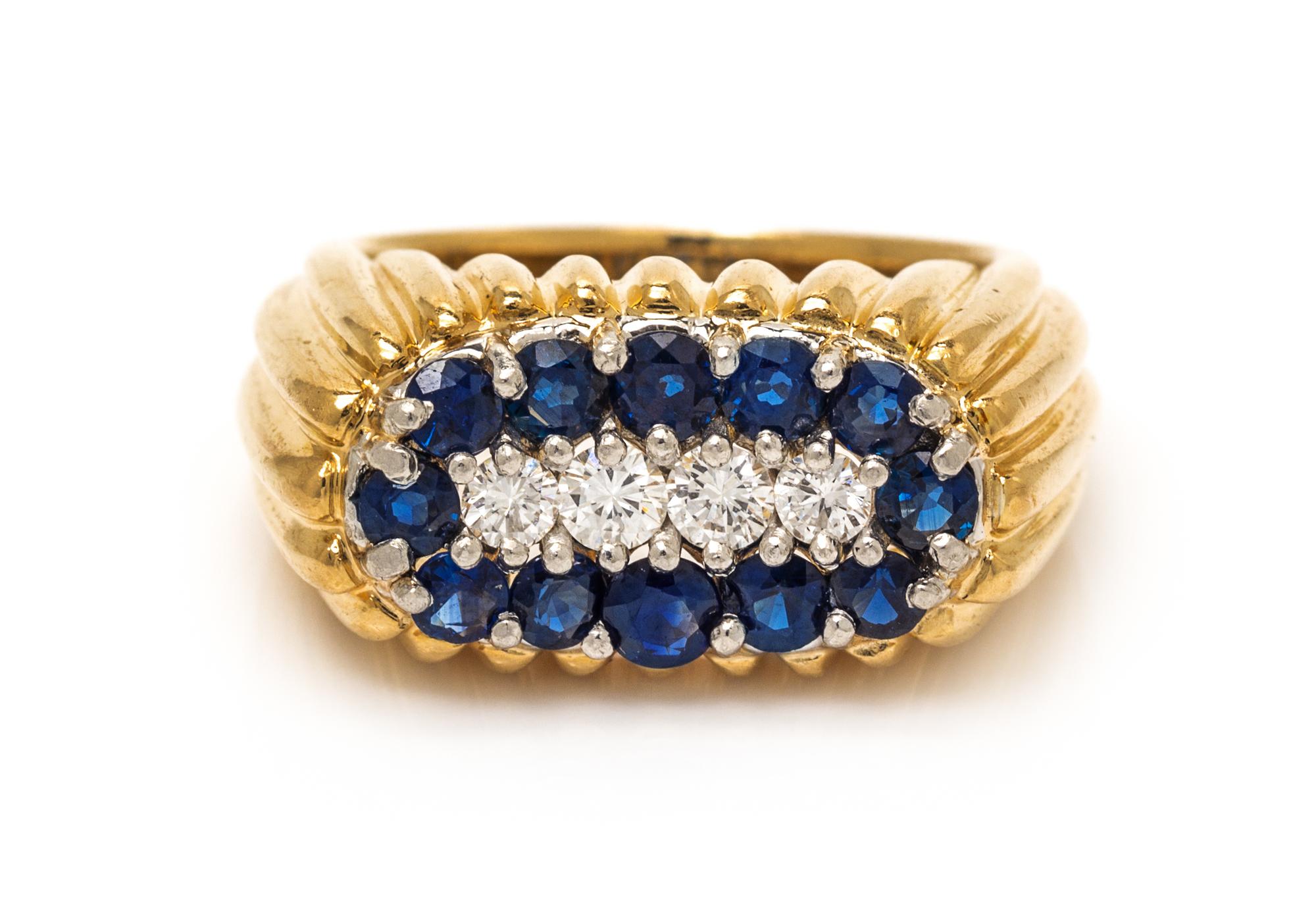 An 18 Karat Yellow Gold, Platinum, Sapphire and Diamond Band, Oscar Heyman Brothers, 10.70 dwts.