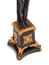 An Empire Style Gilt and Patinated Bronze Eight-Light Candelabrum