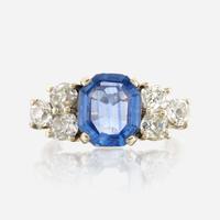 A sapphire, diamond, and white gold ring