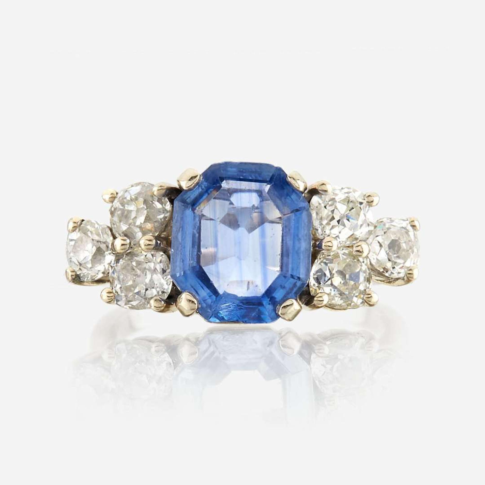 A sapphire, diamond, and white gold ring