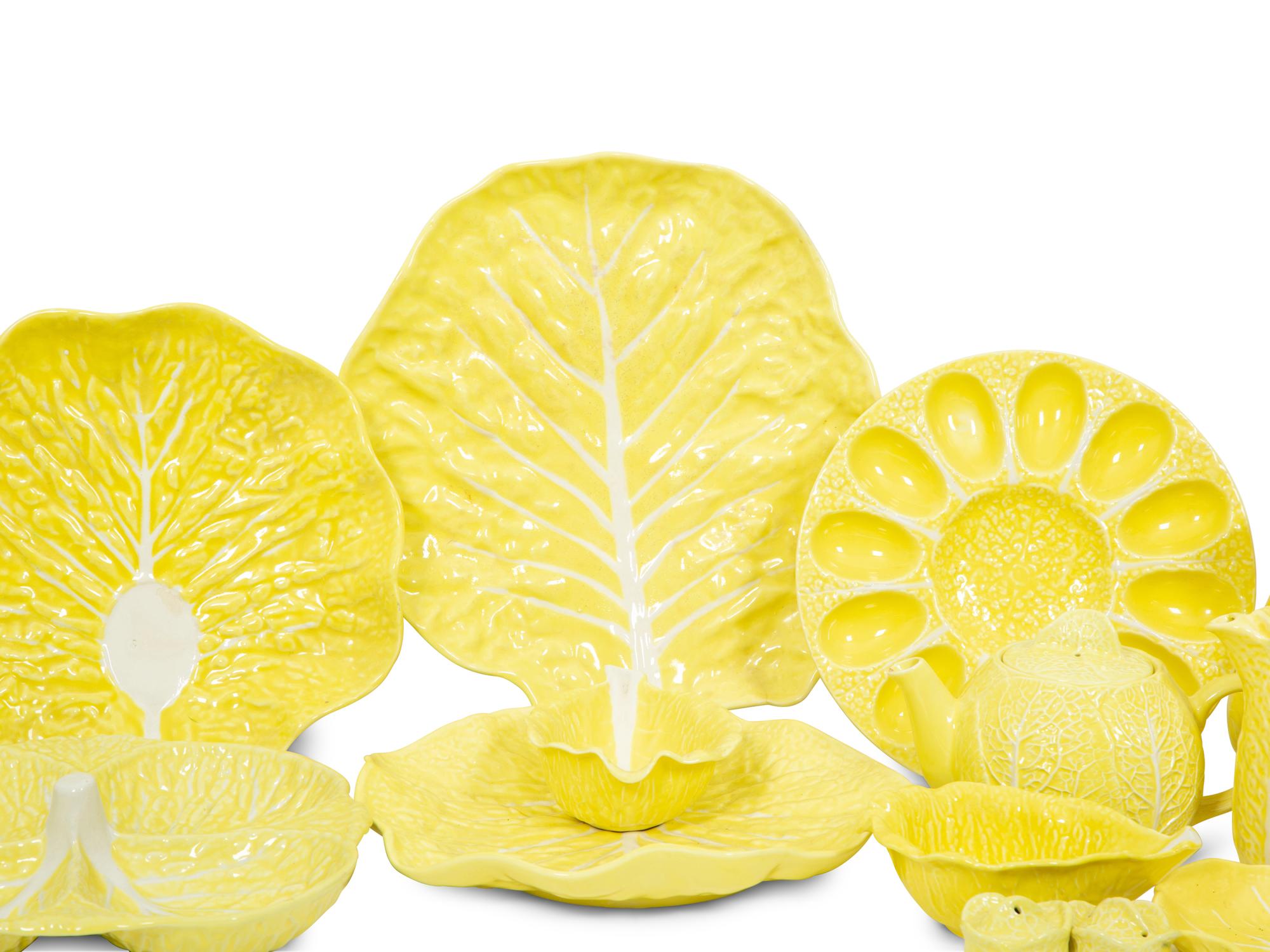 An Extensive Portuguese Yellow Ceramic Lettuce Ware Dinner Service