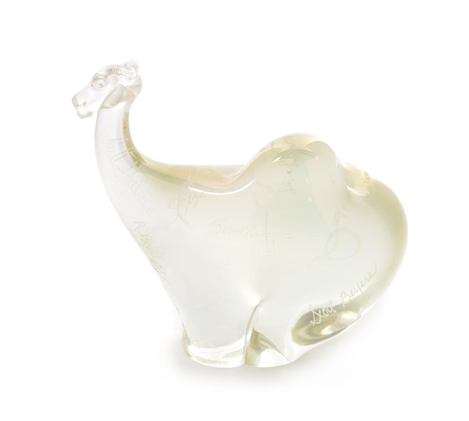 Orient & Flume, Chino, California, a camel iridescent glass paperweight with etched signatures throughout, 1988