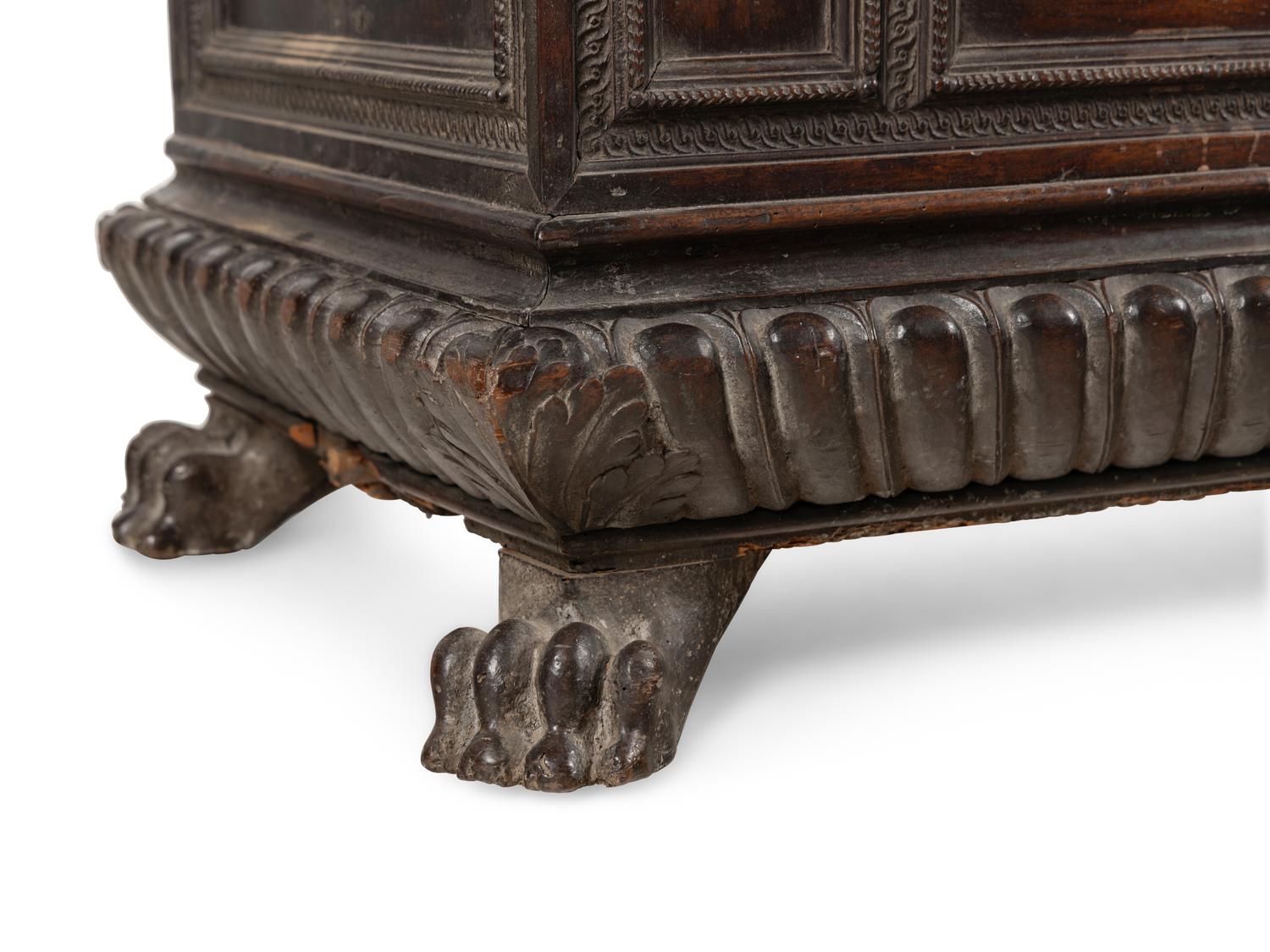 An Italian Carved Walnut Cassone