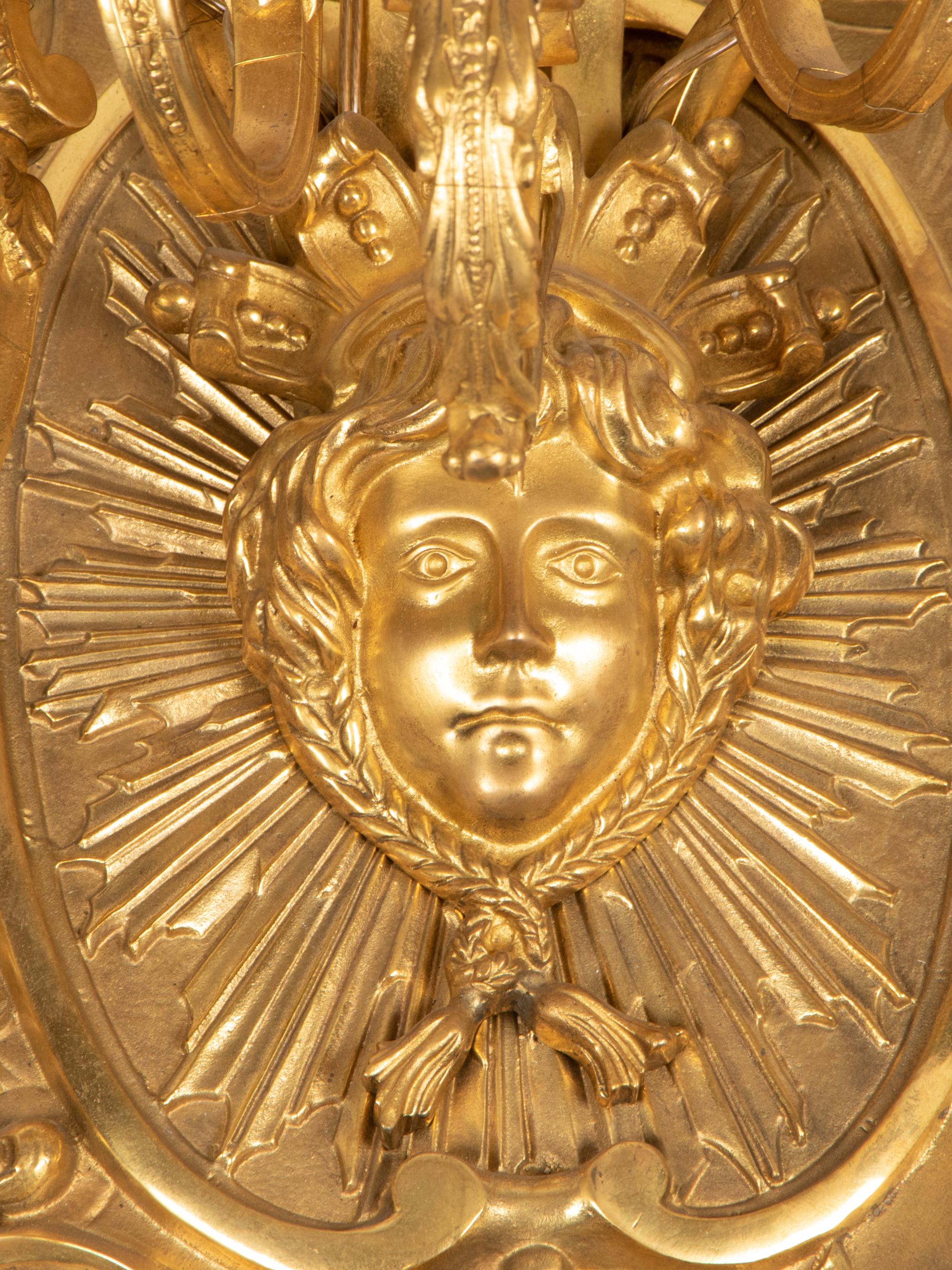 A Set of Four Louis XVI Style Gilt Bronze Five-Light Sconces