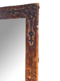 A Continental Iron Mounted Velvet Framed Mirror