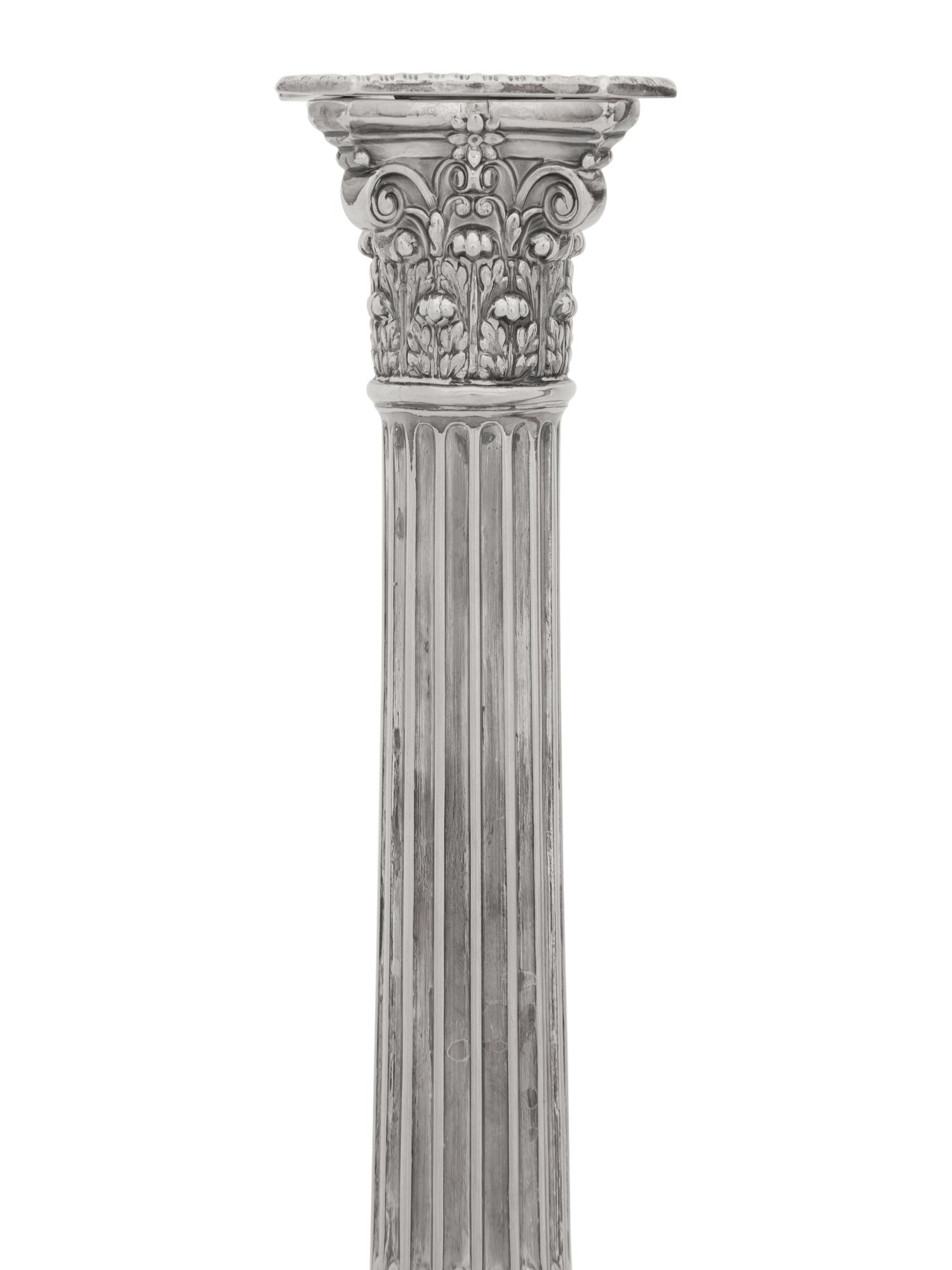 A Pair of Victorian Silver-Plate Candlesticks