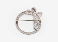 A Platinum and Diamond Circle Pin