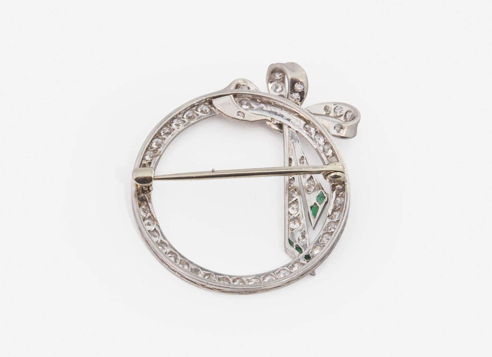 A Platinum and Diamond Circle Pin