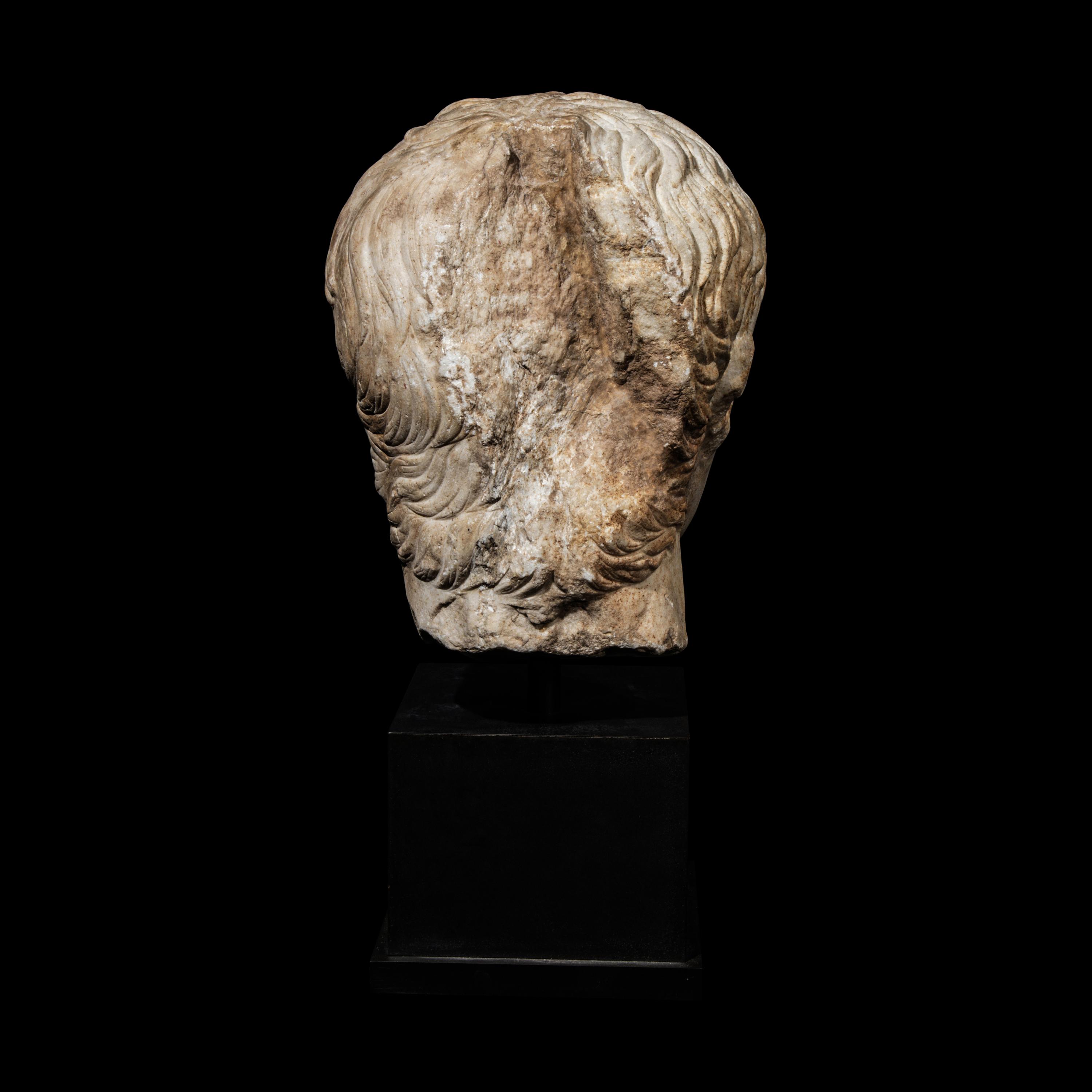 An Over Life-Size Roman Marble Portrait Head of a Julio-Claudian Emperor