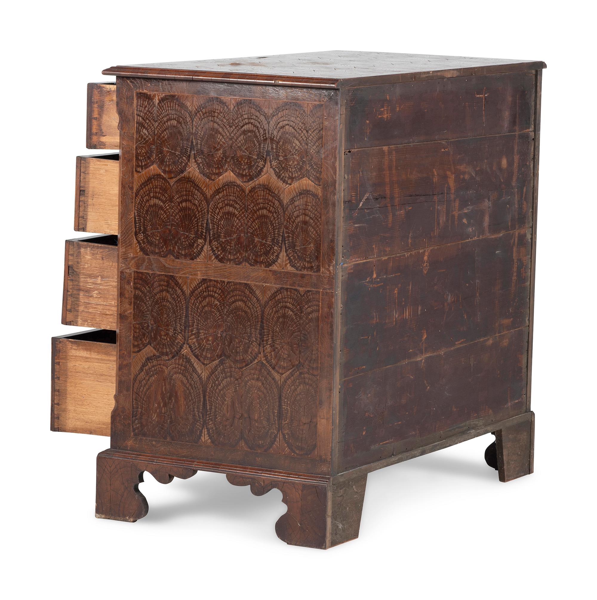 A George III Oysterwood-Veneered Chest of Drawers