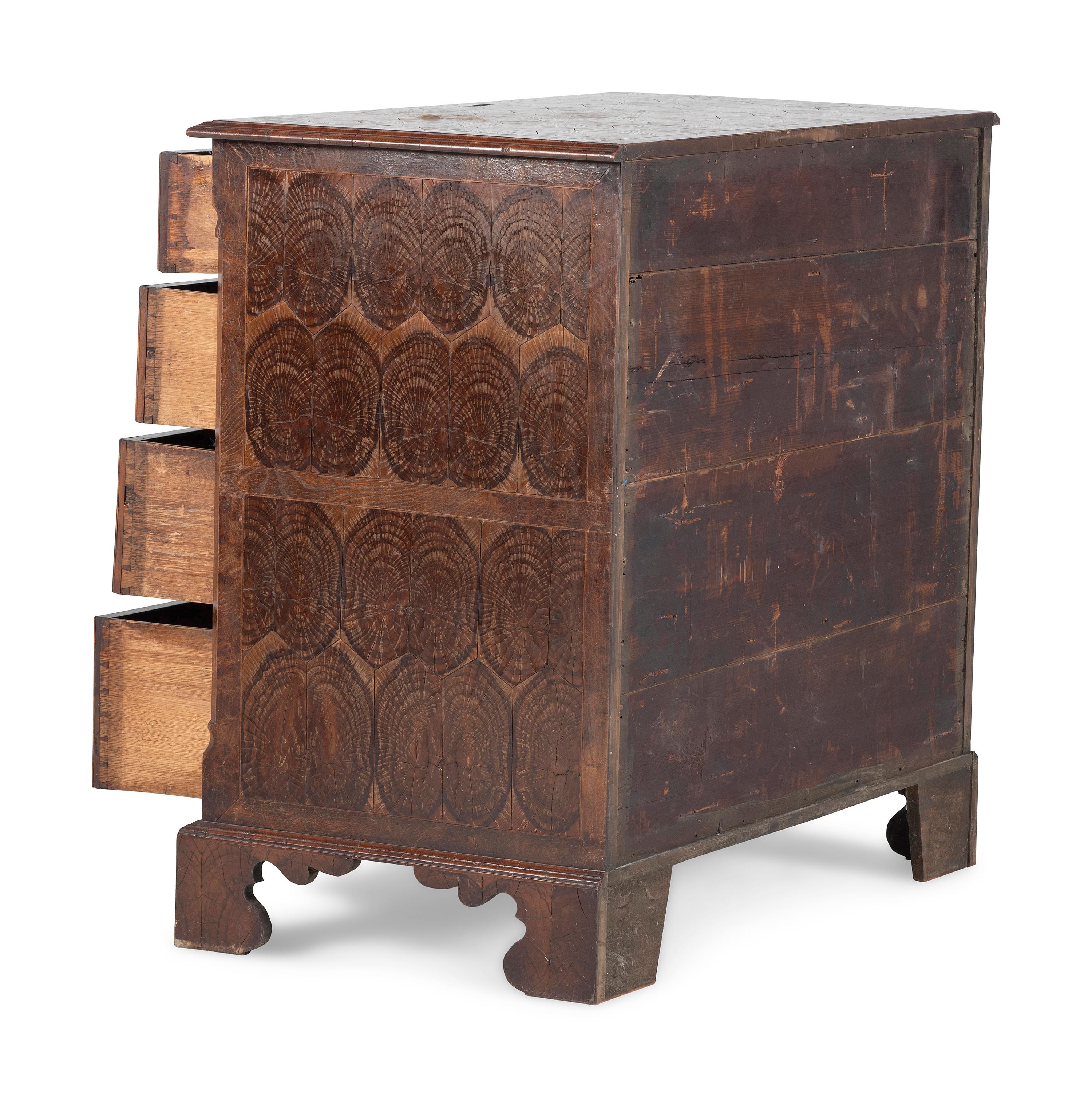 A George III Oysterwood-Veneered Chest of Drawers