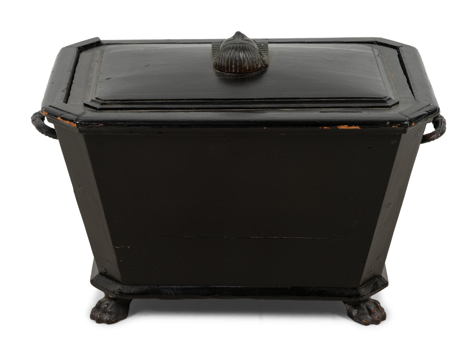 An Egyptian Revival Ebonized Coal Hod