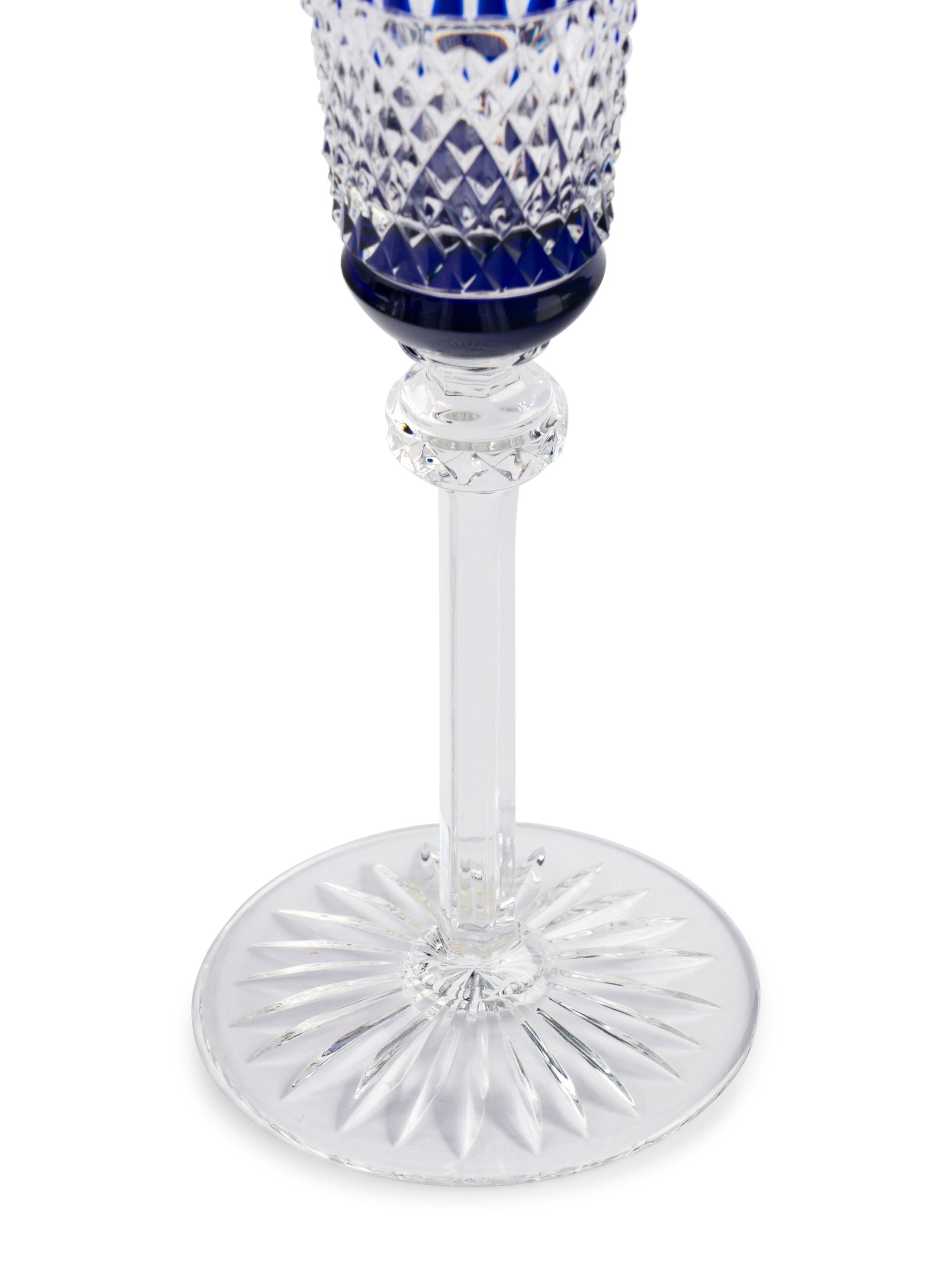 A Set of Fifteen Saint-Louis Cobalt Cut-to-Clear Champagne Flutes