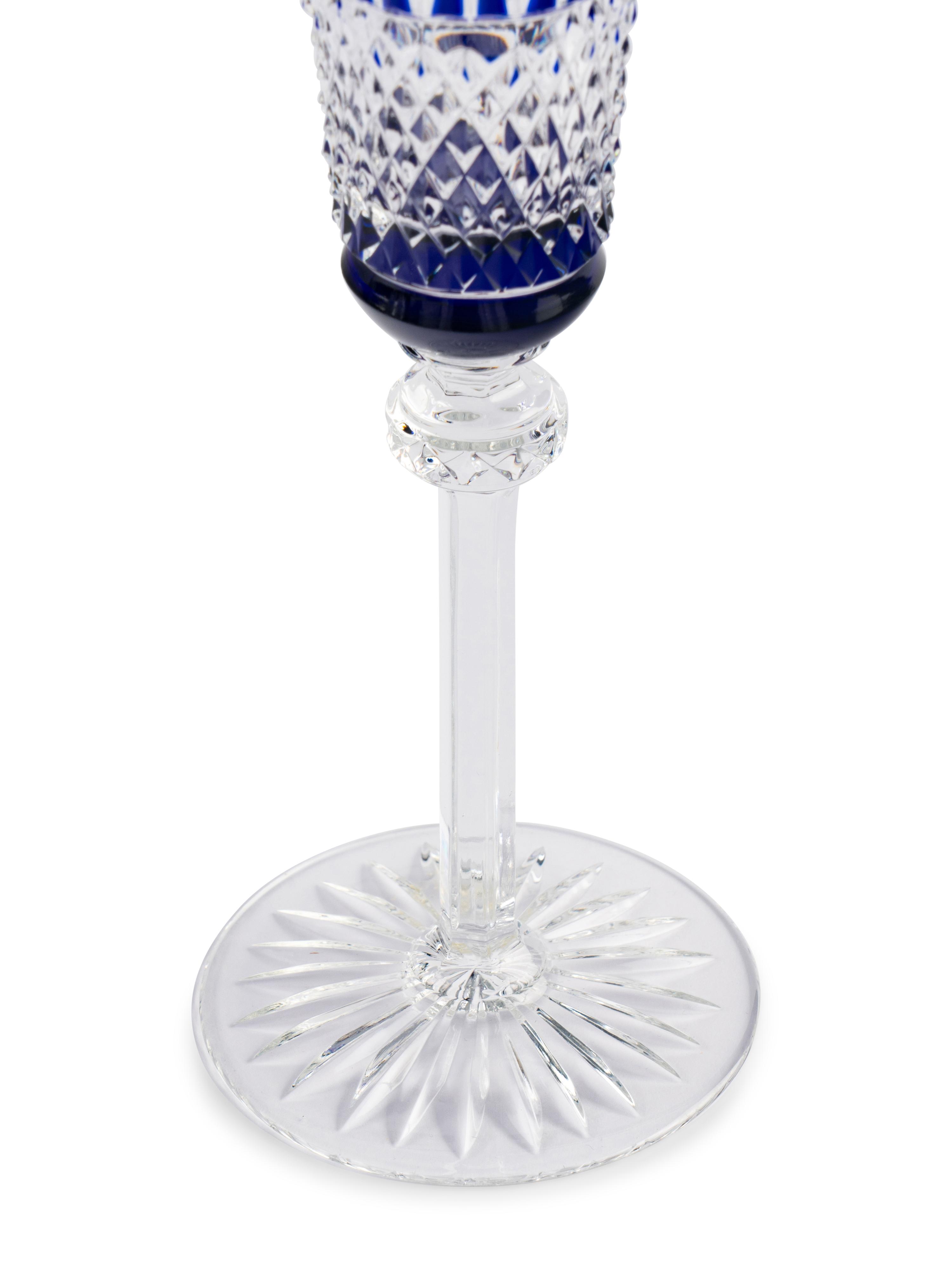 A Set of Fifteen Saint-Louis Cobalt Cut-to-Clear Champagne Flutes