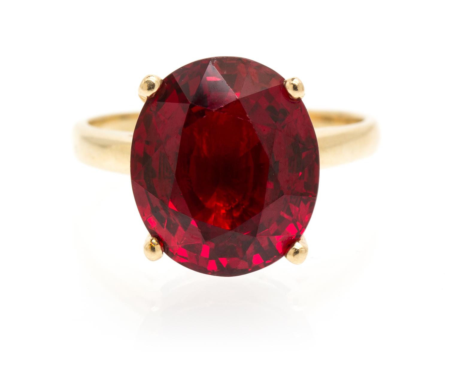 An 11.58 Carat Oval Mixed Cut Burmese Red Spinel, 4.30 dwts. (with setting)