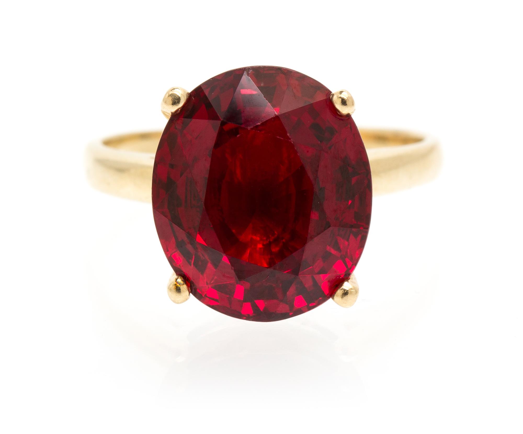 An 11.58 Carat Oval Mixed Cut Burmese Red Spinel, 4.30 dwts. (with setting)