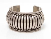 A Sterling Silver Cuff Bracelet, Tom Charley, Navajo, 56.90 dwts.