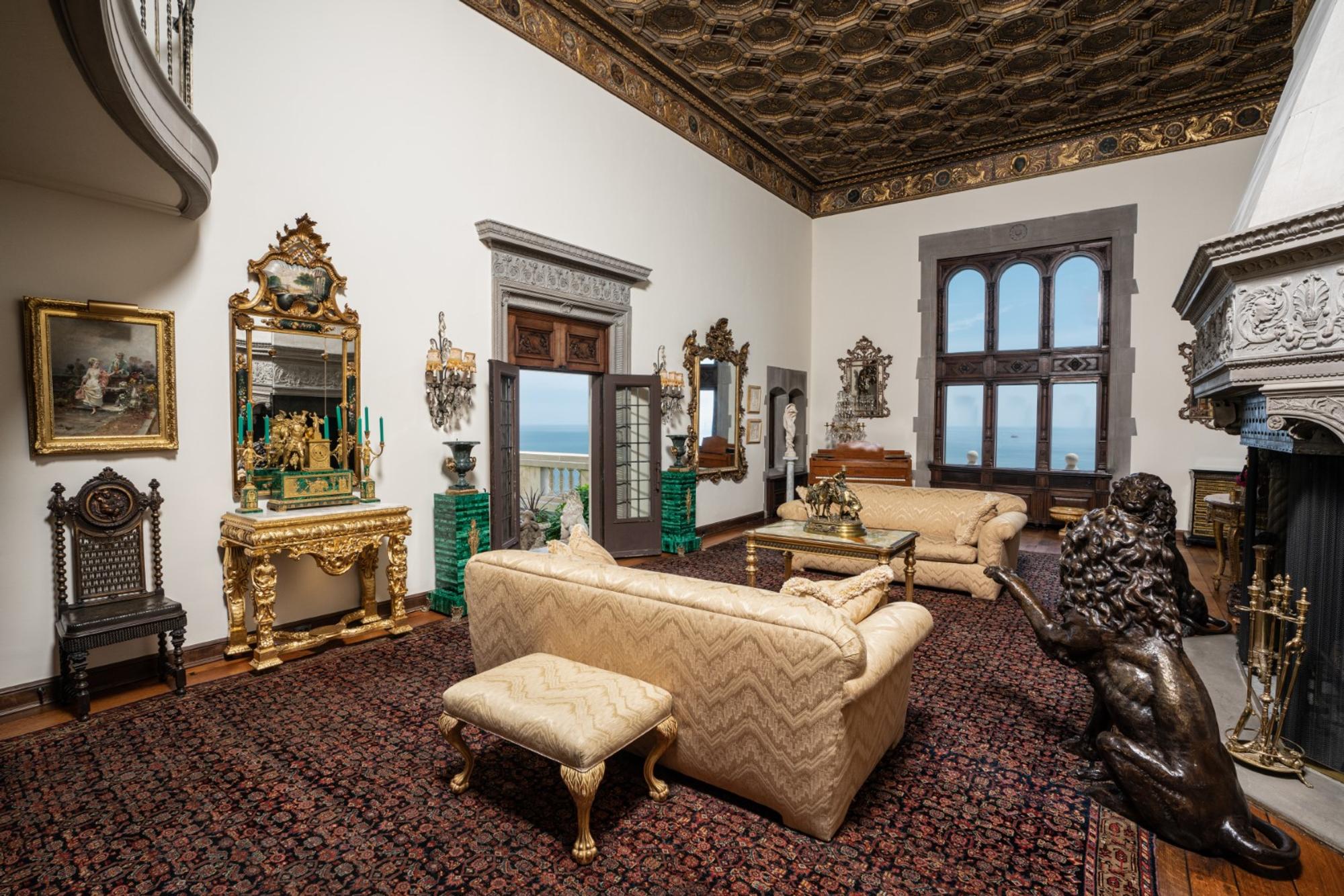 A Pair of Neoclassical Style Gilt Metal Mounted Marble Campagna-Form Urns