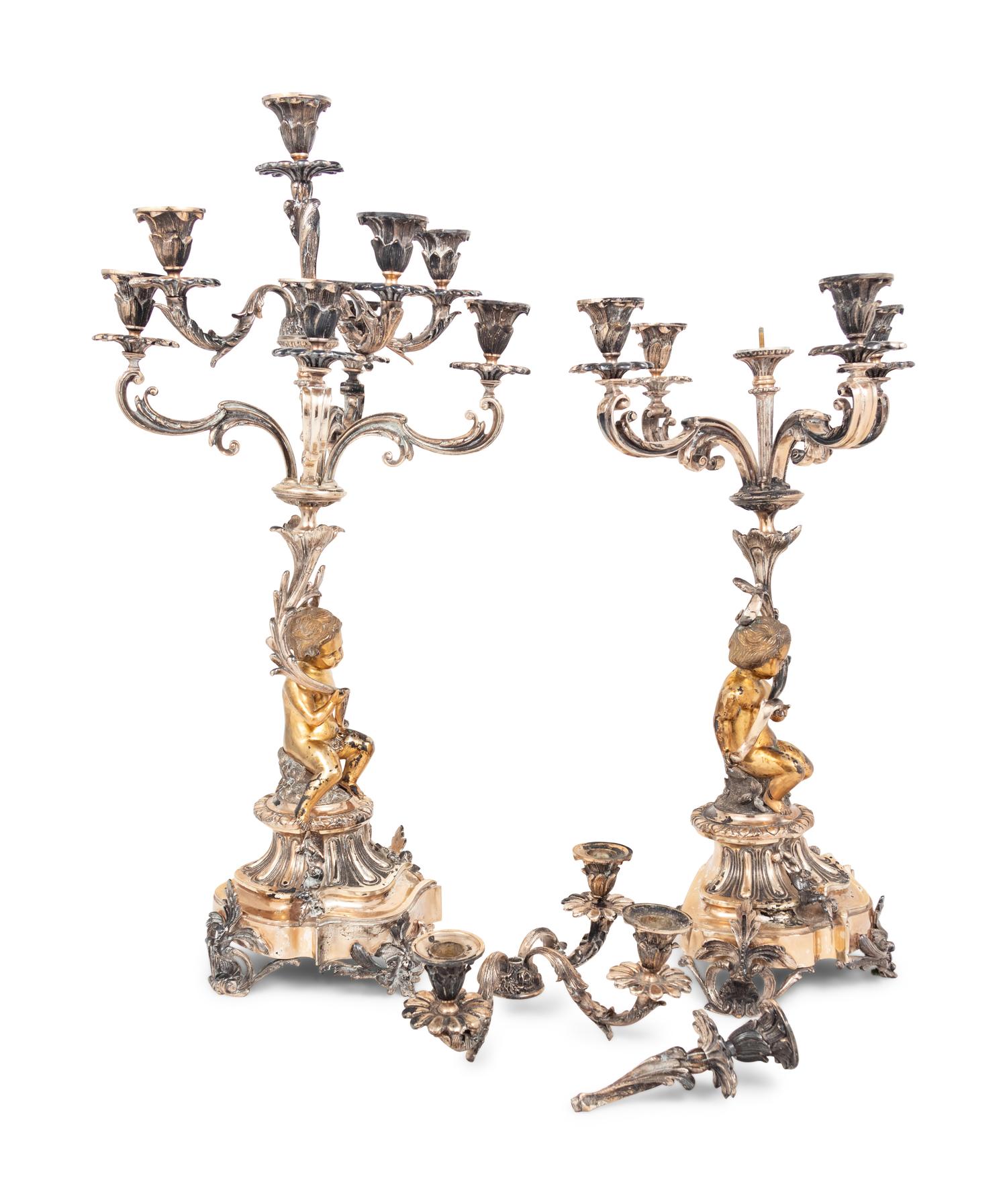 A Pair of Silver-Plate Figural Eight-Light Candelabra
