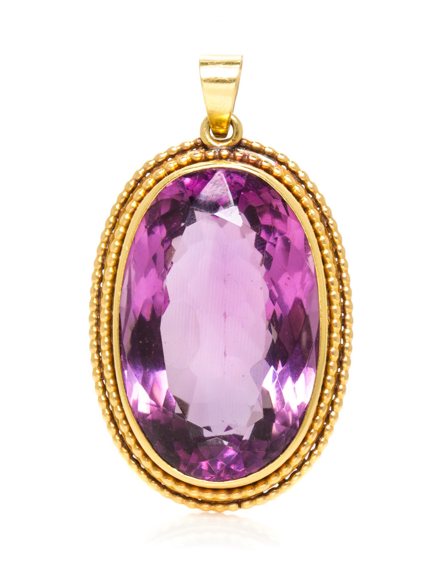 An 18 Karat Yellow Gold and Amethyst Pendant, 16.30 dwts.