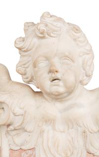 A Pair of Italian Carved Marble Figural Corbel Capitals