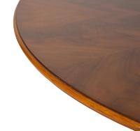 A Pair of Regency Style Mahogany Circular Dinner Tables