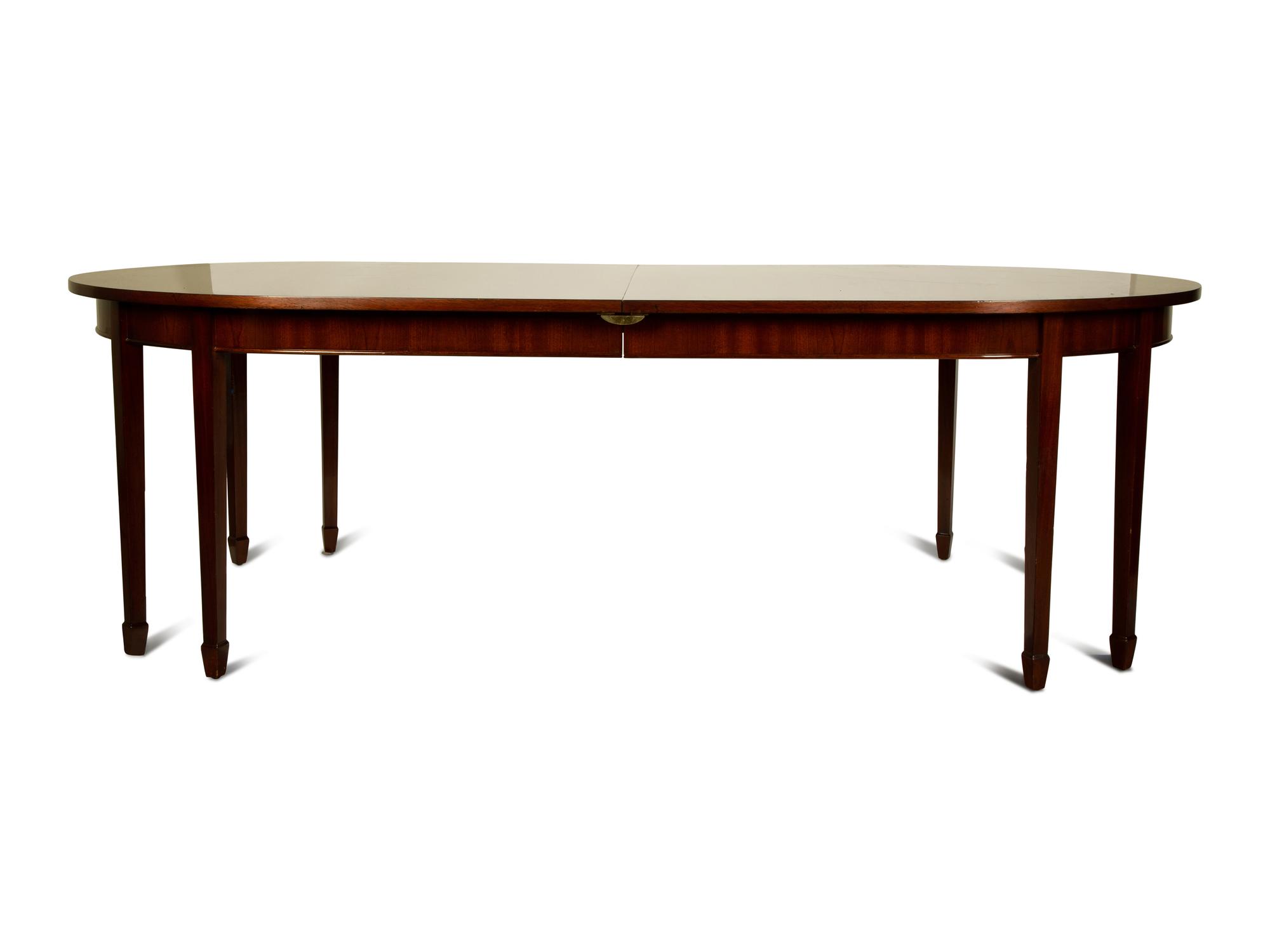 A George III Style Mahogany Dining Table — 19TH CENTURY