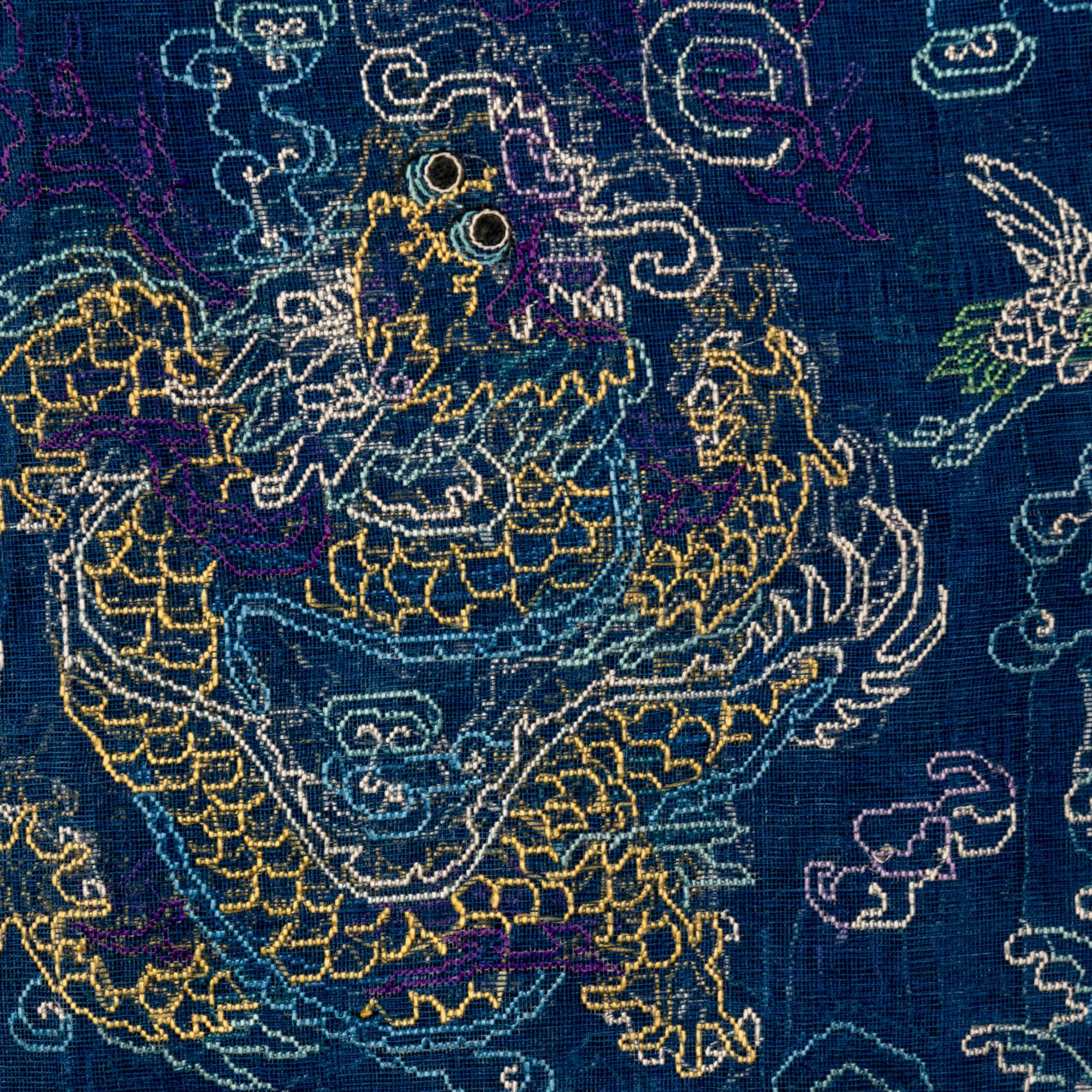 A Chinese Summer Gauze 'Dragon' Robe, Jifu, Late 19th Century 清晚期 藍地納紗繡雲龍紋夏吉服
