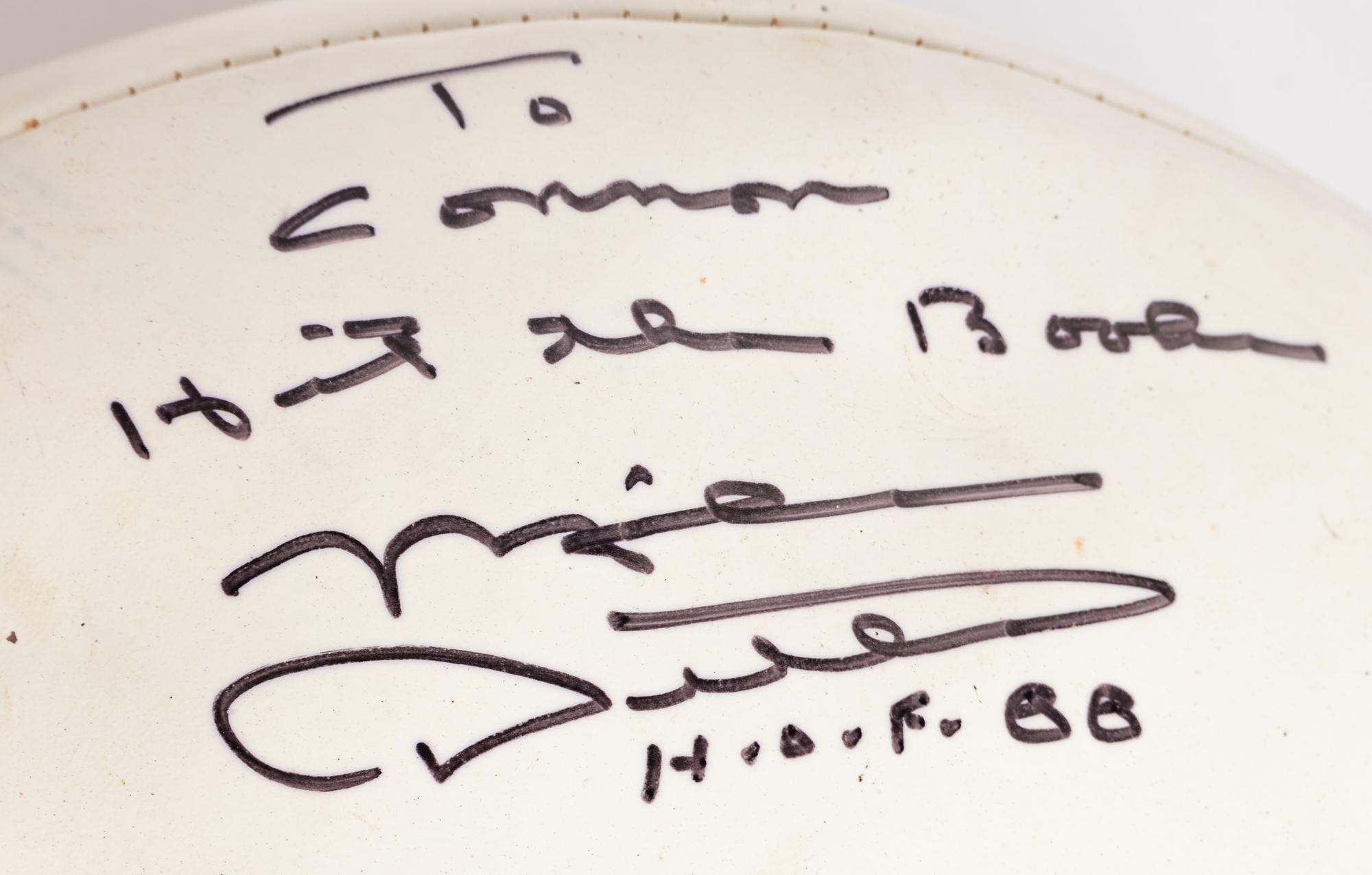 A Group Mike Ditka’s Restaurant Gift Shop Items Including Autograph Model Footballs Signed by Mike Ditka