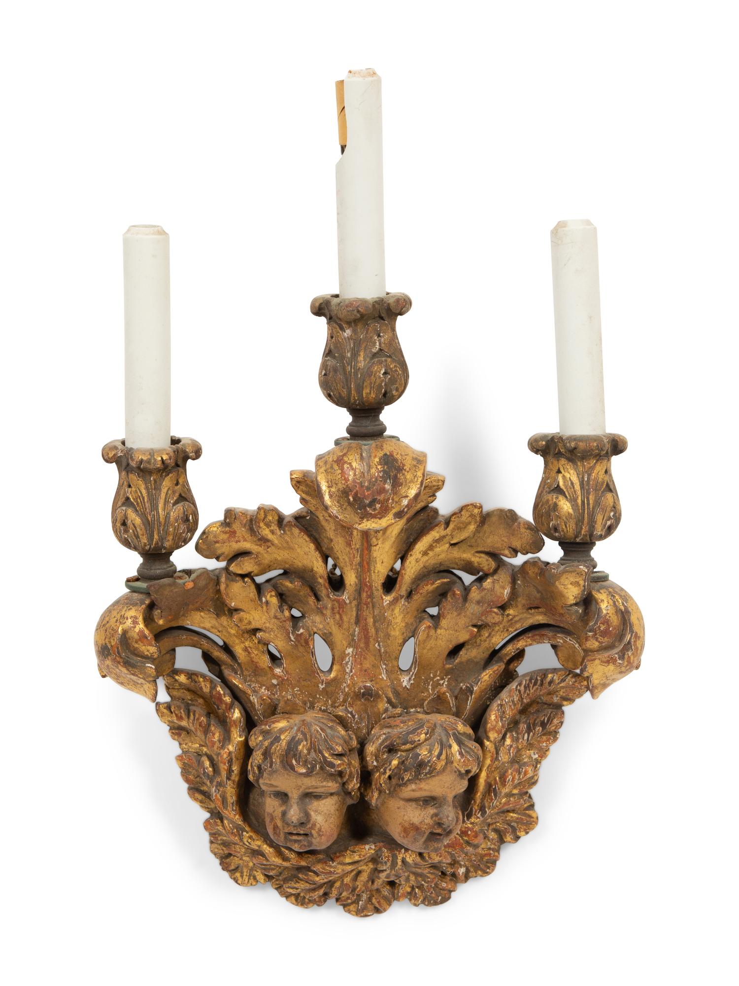 An Italian Baroque Style Giltwood Three Light Wall Sconce