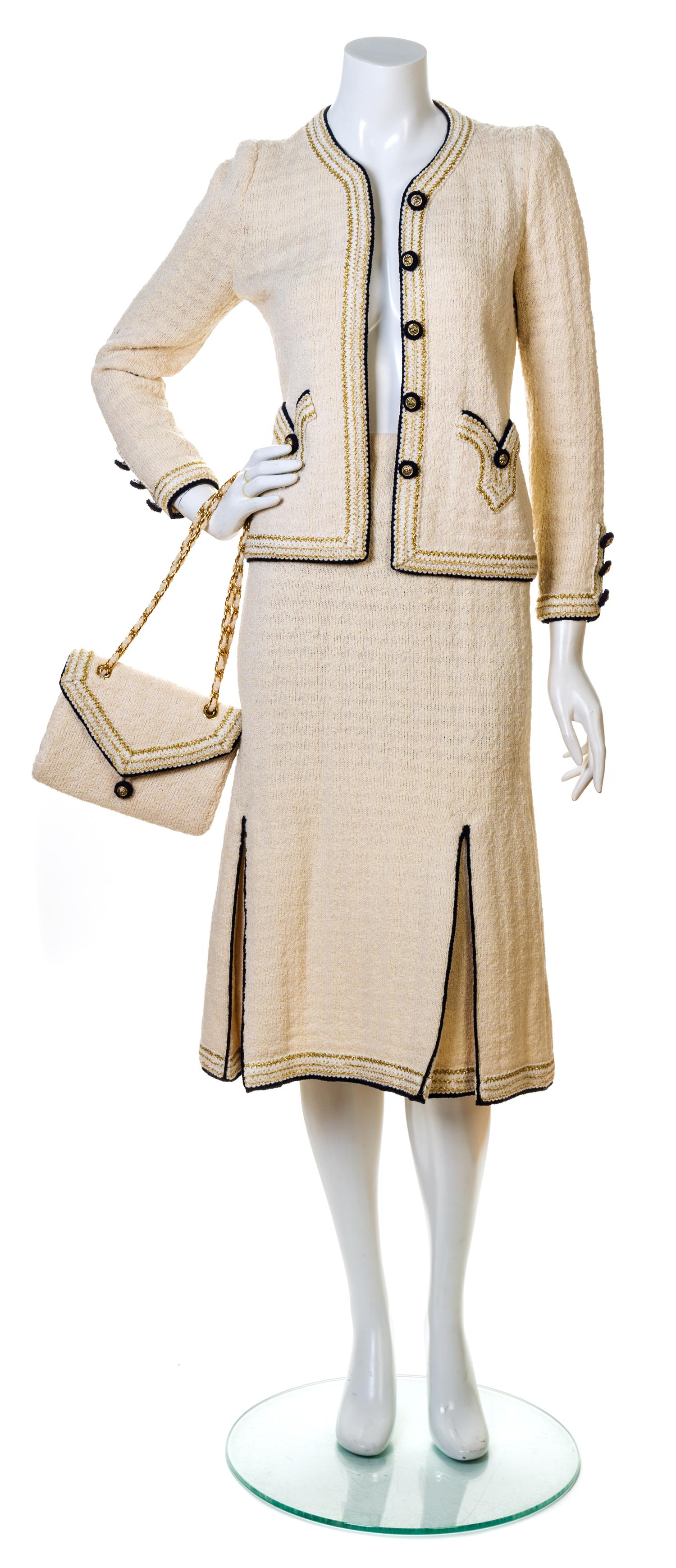 An Adolfo Cream, Gold and Navy Knit Skirt Ensemble, No size. Handbag: 8.5'' x 6''; Strap drop: 10.5''.