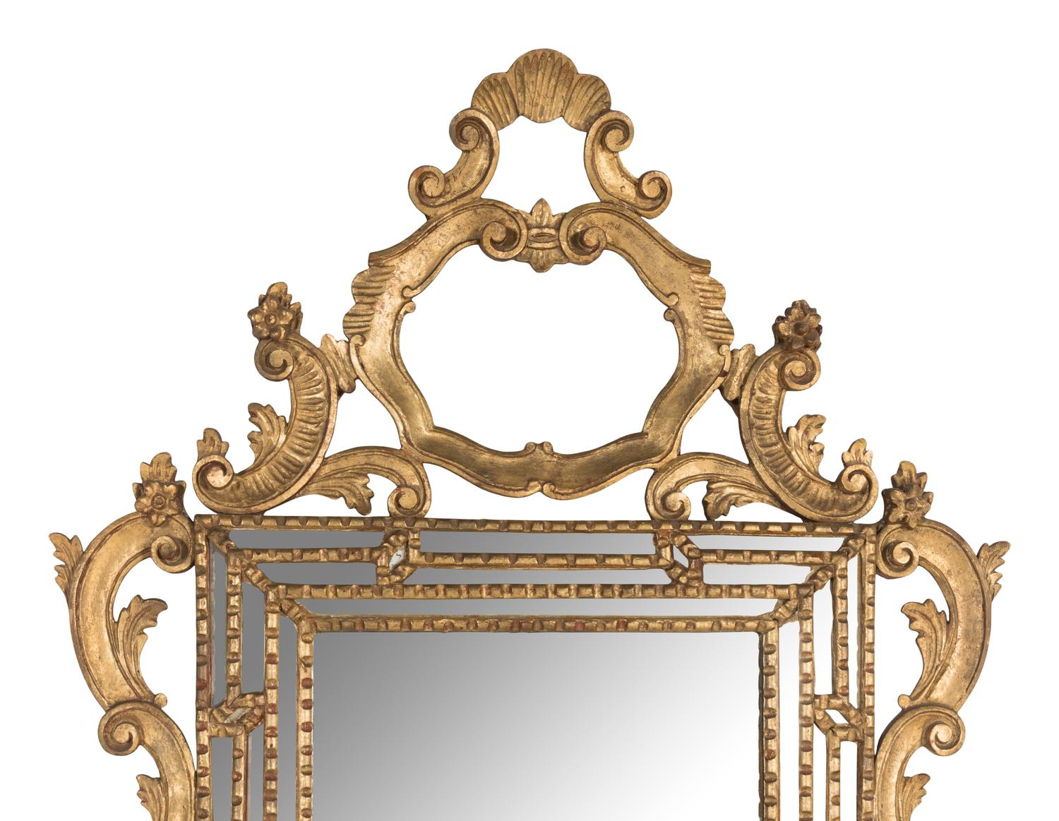 An Italian Baroque Style Giltwood Mirror