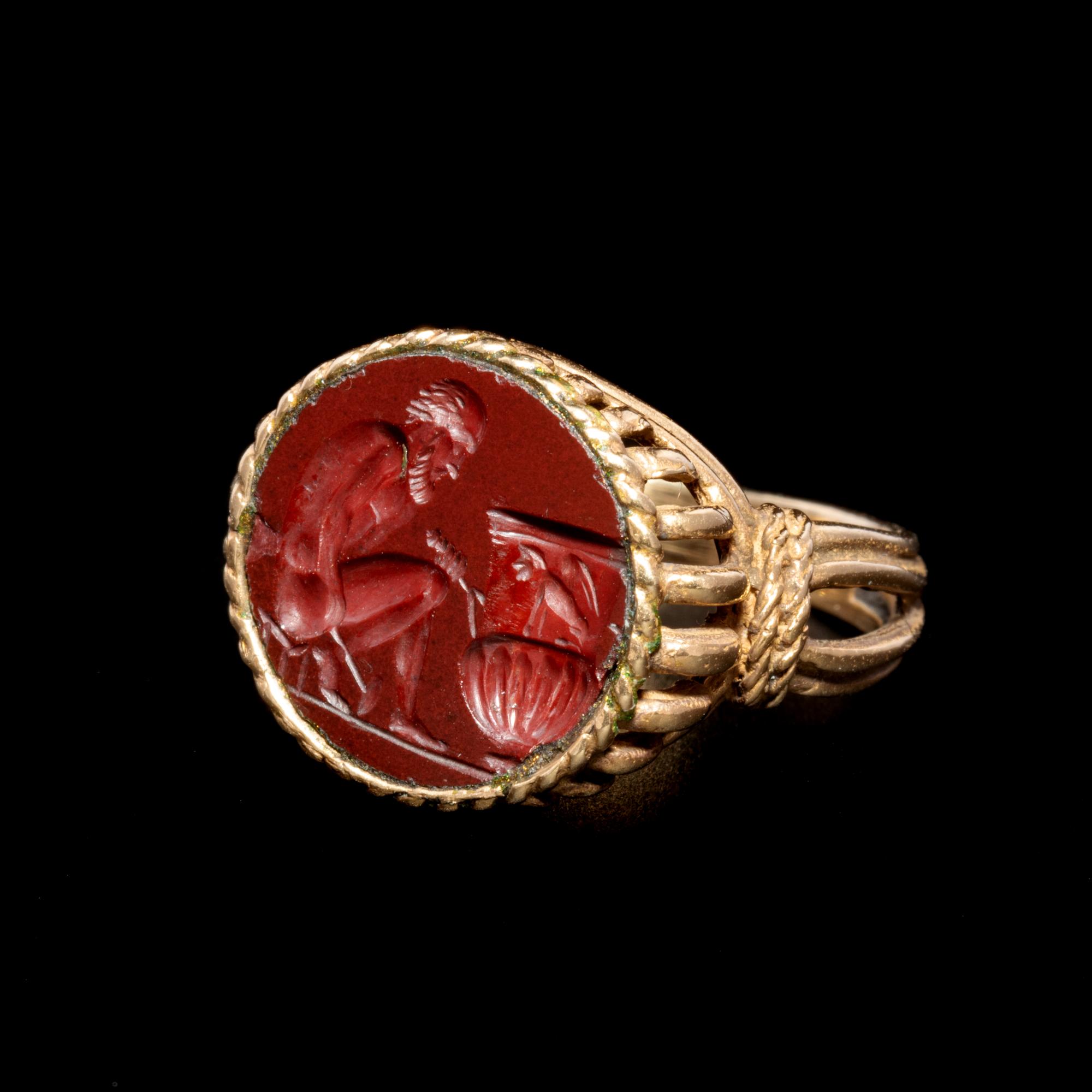 A Roman Red Jasper Ring Stone of a Nude Sculptor