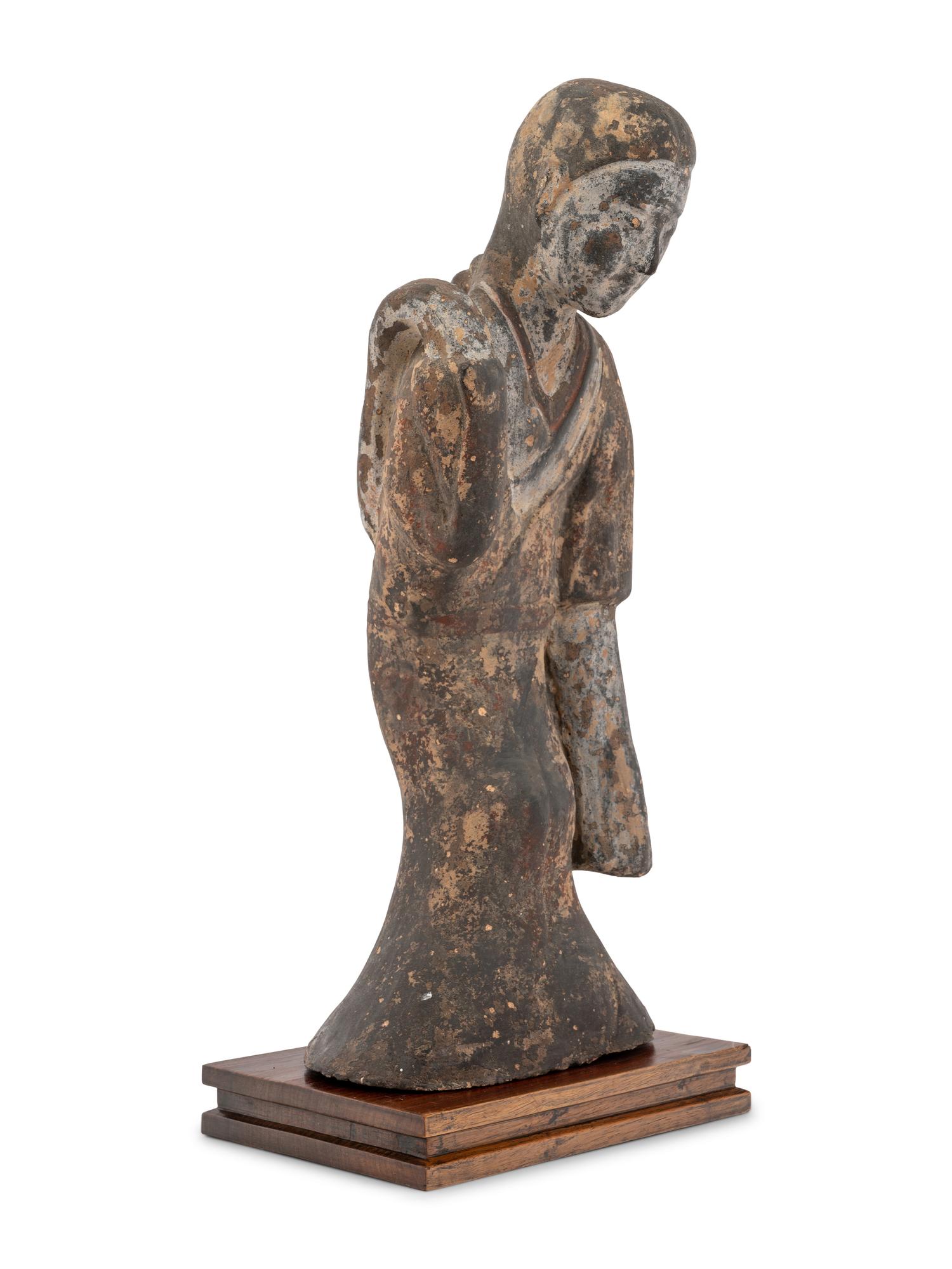 A Chinese Grey Pottery Figure of a Court Lady