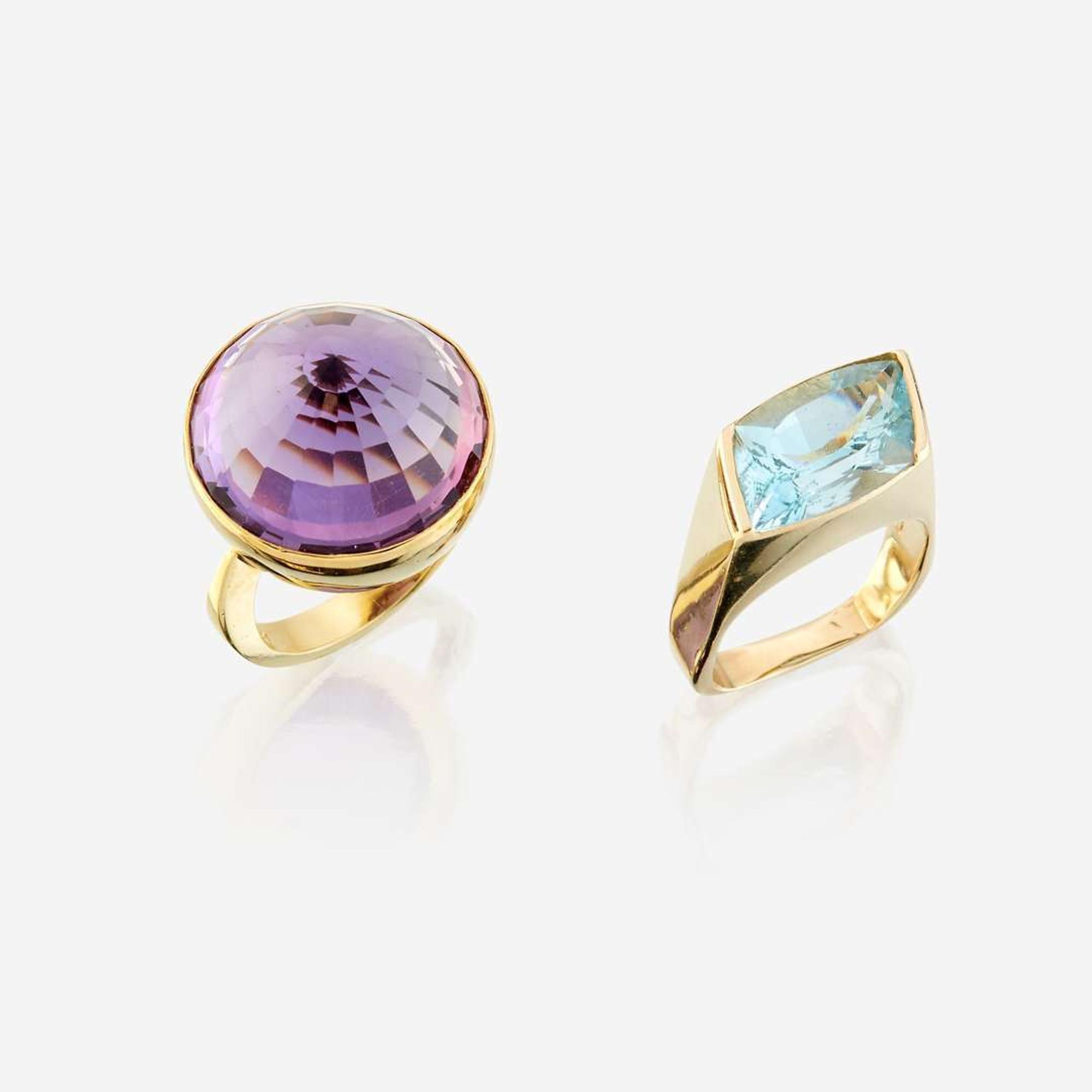 Two fourteen karat gold and gem-set rings