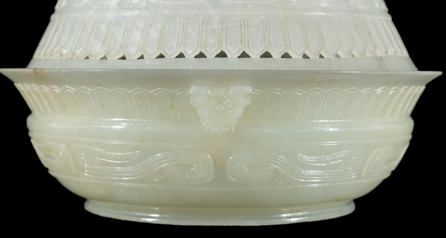 A Chinese Carved and Pierced 'Archaistic' White Jade Bowl and Cover