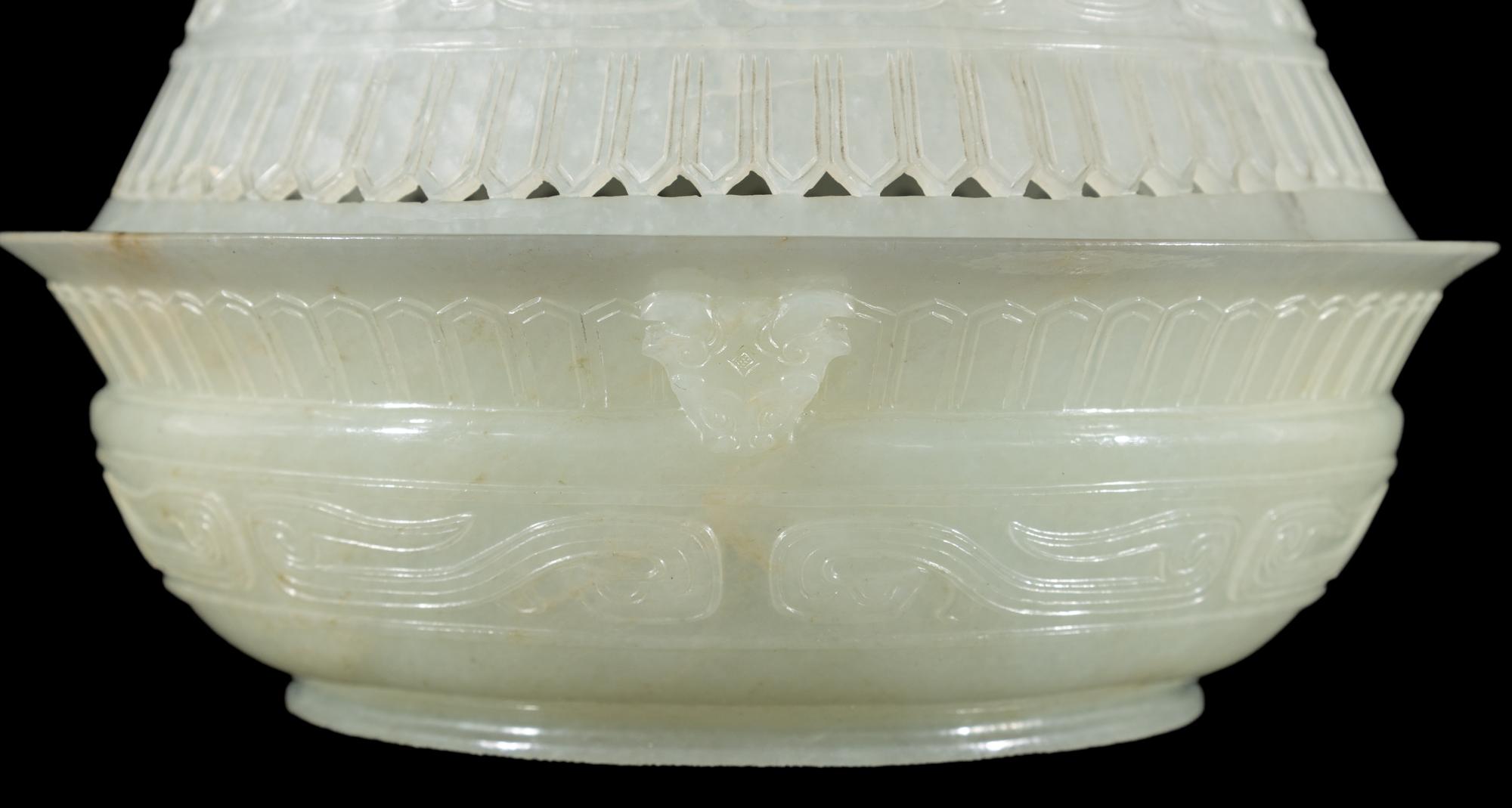 A Chinese Carved and Pierced 'Archaistic' White Jade Bowl and Cover