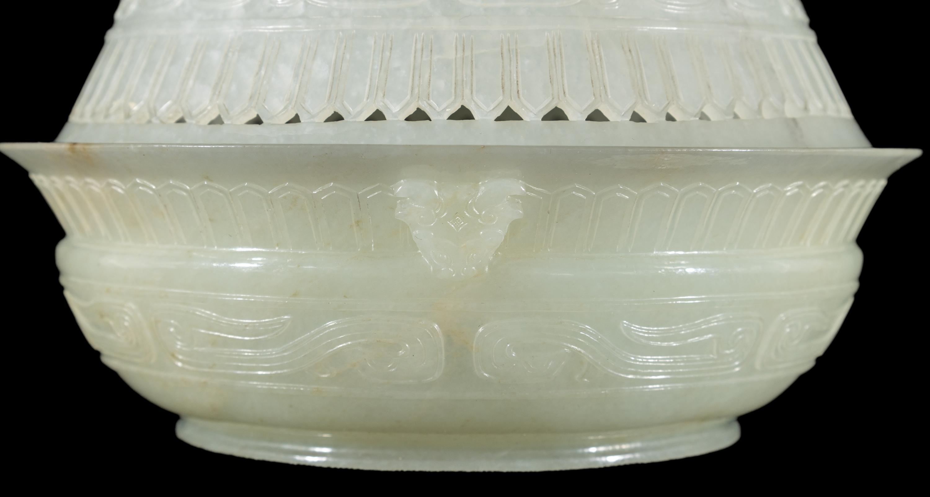 A Chinese Carved and Pierced 'Archaistic' White Jade Bowl and Cover