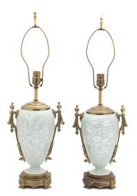 A Pair of French Ormolu Mounted Pate-sur-pate Celadon Glazed Porcelain Lamps Height overall 29 inches. — 19TH CENTURY
