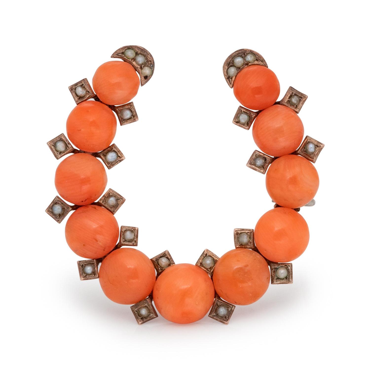 A Victorian Silver, Coral and Seed Pearl Horseshoe Brooch,